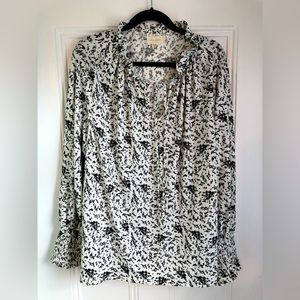 Size 3X black and creamy white top.  Perfect for the office.